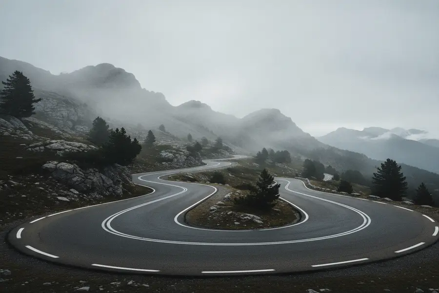 Winding mountain tarmac road for cycling stages